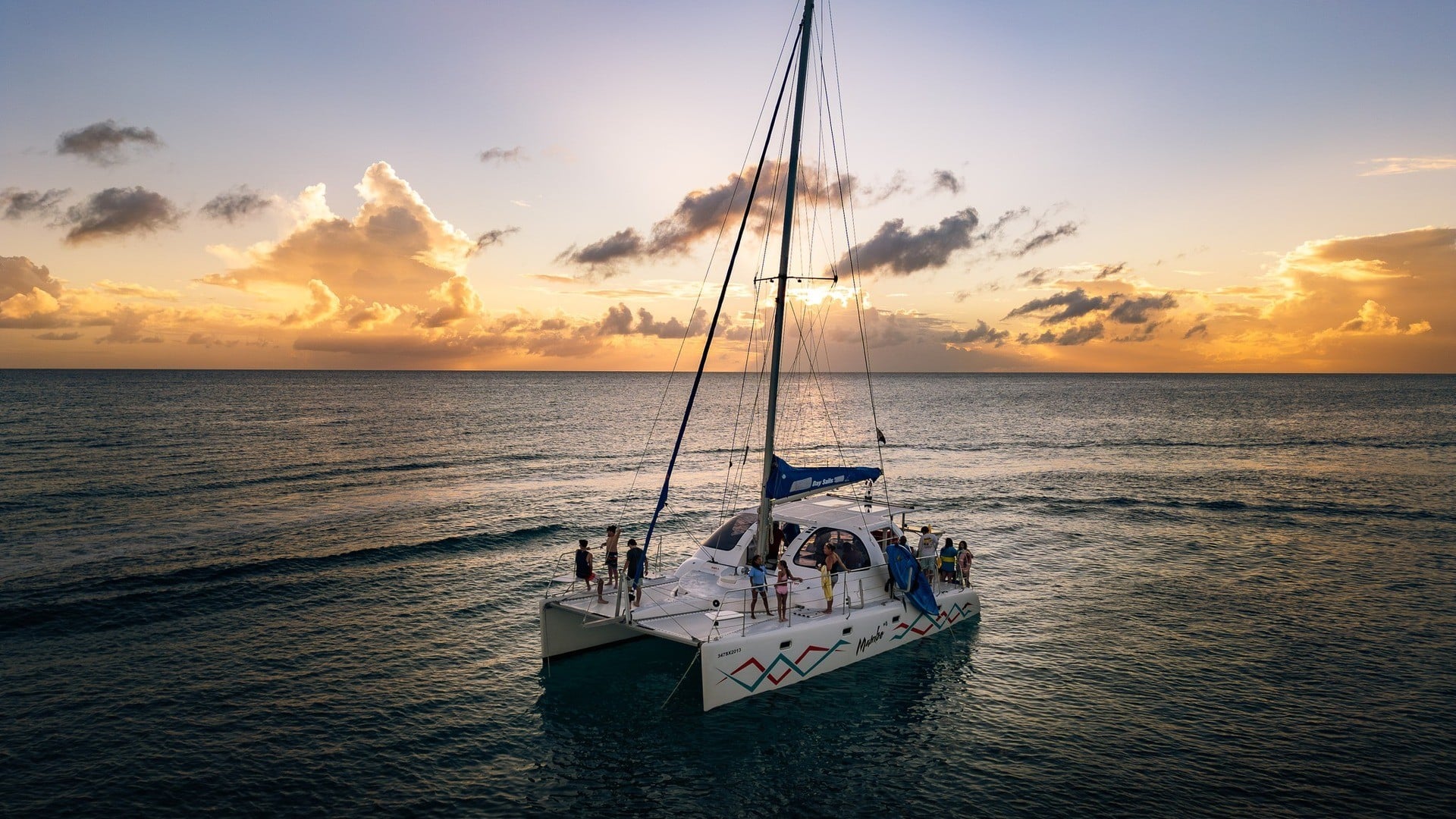 Catamaran Mambo Splash Into Sunset - Group Charter
