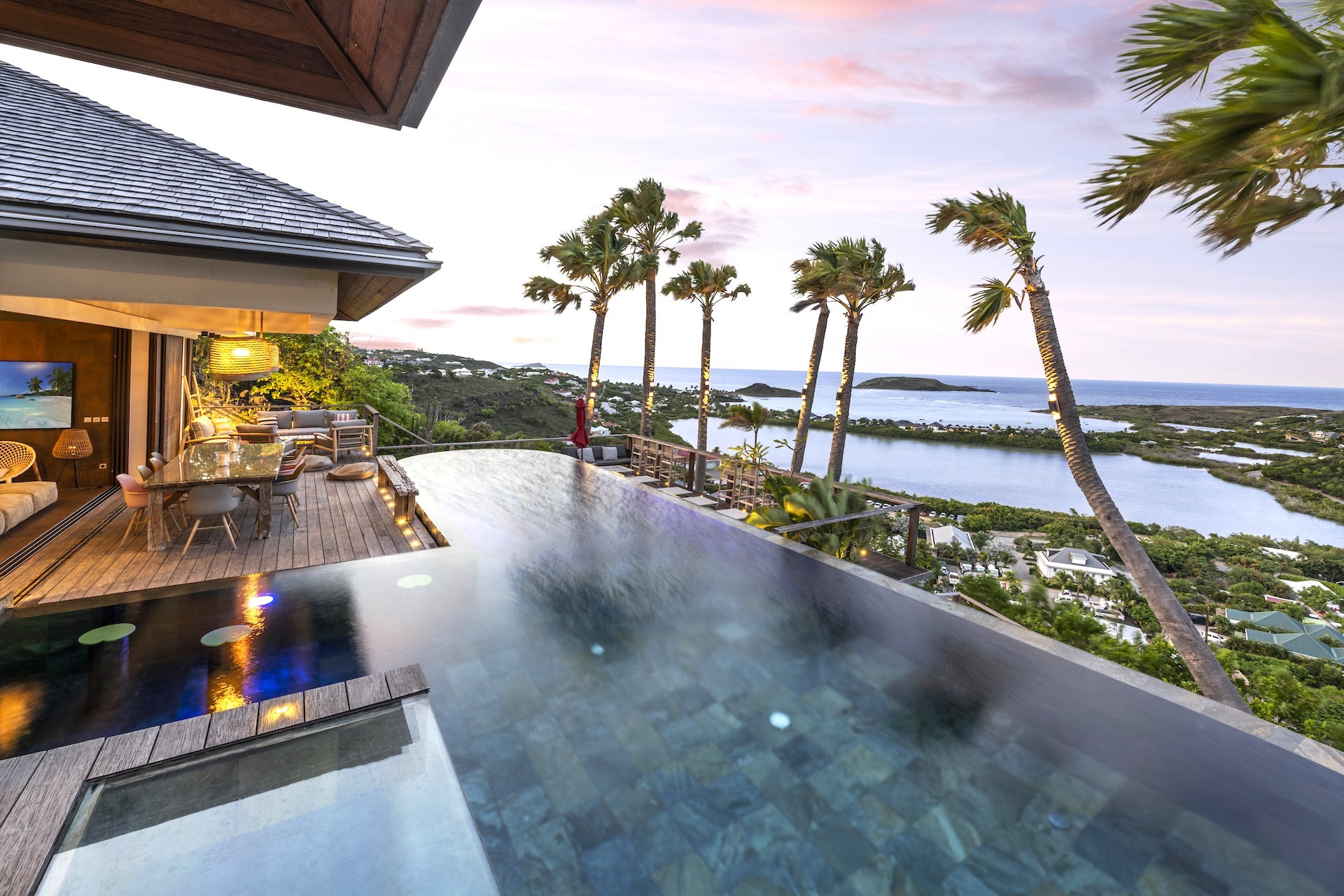 Casa Pablo, St Barts luxury rental, with infinity pool blending into breathtaking lagoon views